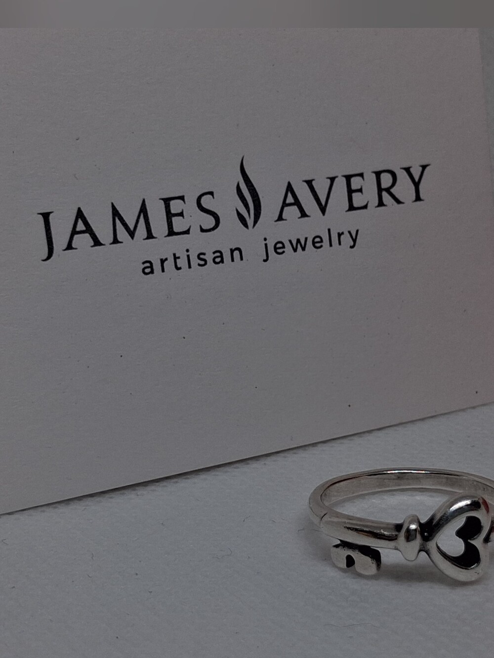 Authentic retired James Avery "Key to My Heart" sterling silver wraparound ring